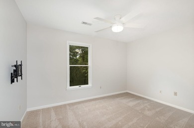 Tucked away on five private acres with a stream that feeds into - photo 21