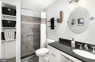 Tucked away on five private acres with a stream that feeds into - photo 27