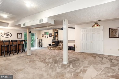 Tucked away on five private acres with a stream that feeds into - photo 29