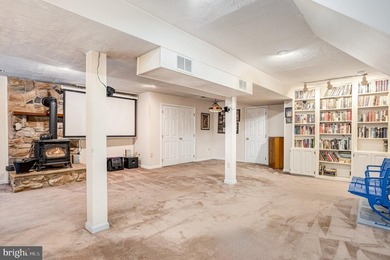 Tucked away on five private acres with a stream that feeds into - photo 32