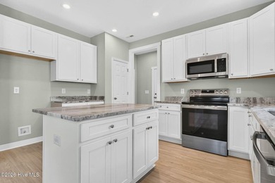 New Construction. Open floor plan with split bedrooms, covered - photo 11