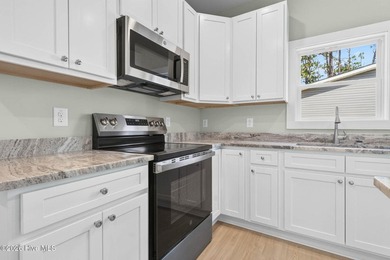 New Construction. Open floor plan with split bedrooms, covered - photo 14