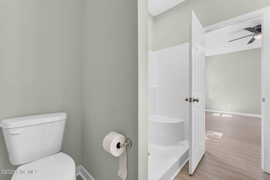 New Construction. Open floor plan with split bedrooms, covered - photo 22