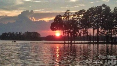 This Badin Lake water view lot is located in the prestigious - photo 30
