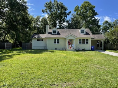 Exceptional investment opportunity or future home! This 4- - photo 1