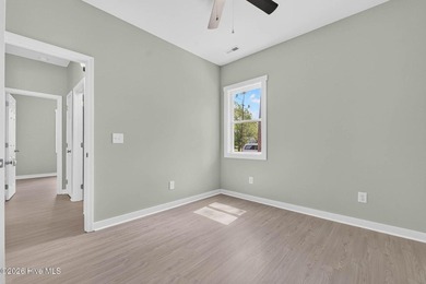 New Construction. Open floor plan with split bedrooms, covered - photo 33