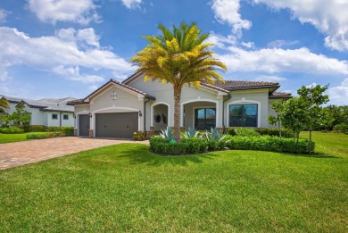 Lake Home For Sale in Palm Beach Gardens, Florida