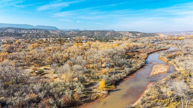 A rare opportunity to own 5 acres with Chama River frontage