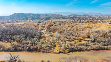 A rare opportunity to own 5 acres with Chama River frontage