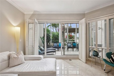 Experience coastal luxury at its finest in this rare three-story - photo 9