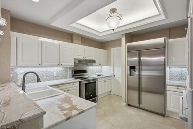 Experience coastal luxury at its finest in this rare three-story - photo 10