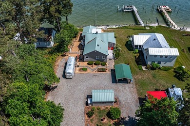 In the quaint waterfront community of Deltaville, where life - photo 41