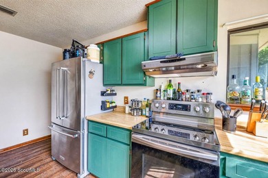 Welcome home to this charming 3-bedroom, 2-bath residence in the - photo 11