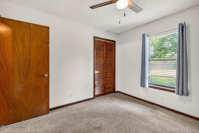 Welcome home to this charming 3-bedroom, 2-bath residence in the - photo 18