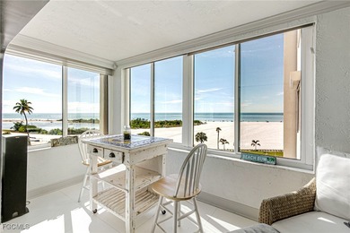 Motivated seller! Discover this unique piece-of-art beachfront - photo 2