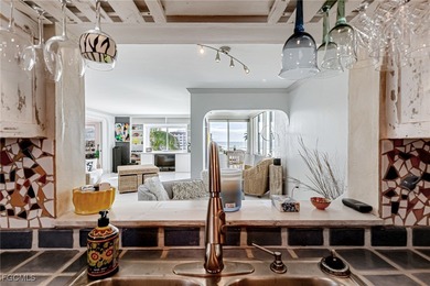 Motivated seller! Discover this unique piece-of-art beachfront - photo 9