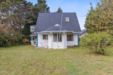 Discover coastal living in this charming 1950s cottage-style - photo 1