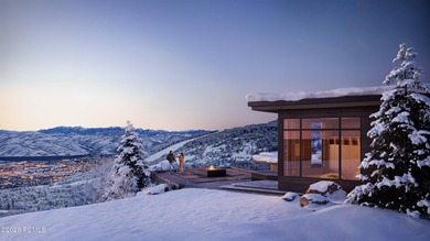 This exquisite ski-in/ski-out masterpiece is nestled in the - photo 12