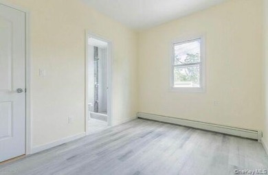 Live Rent-Free in This Beautiful TWO-Family Home! LAYOUT LIKE A - photo 3