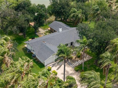 Stunning lakefront home sitting on over an acre in the exclusive - photo 1