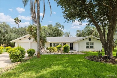 Stunning lakefront home sitting on over an acre in the exclusive - photo 3