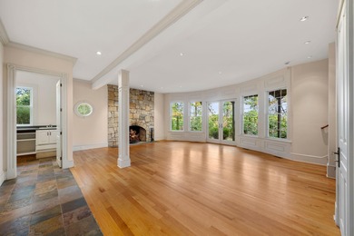 A captivating estate set atop a bluff with panoramic views of - photo 8
