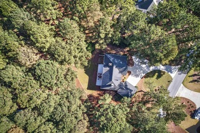 Nestled among the pines in the heart of Cuscowilla, this - photo 49