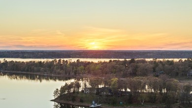 Enjoy lake living with sunrise and sunsets & new construction - photo 5