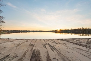 Enjoy lake living with sunrise and sunsets & new construction - photo 7