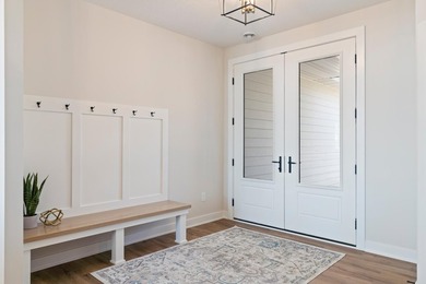 Enjoy lake living with sunrise and sunsets & new construction - photo 8