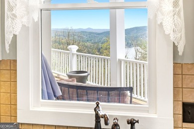 Located in the exclusive gated community of Lake Rabun Bluffs in - photo 15