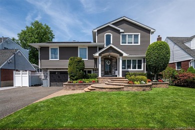 Welcome Home to this ABSOLUTELY SPECTACULAR expanded ranch in - photo 1