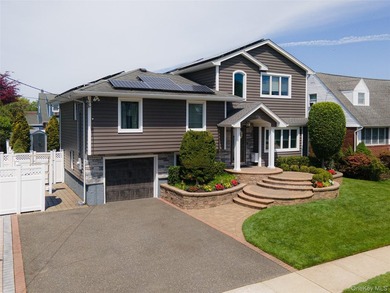 Welcome Home to this ABSOLUTELY SPECTACULAR expanded ranch in - photo 2