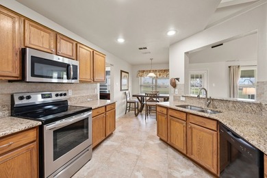 Welcome to lakeside living in the community of Runaway Bay! This - photo 12