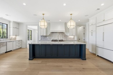 COMPLETELY RENOVATED. REIMAGINED. PRACTICALLY REBUILT FROM THE - photo 14