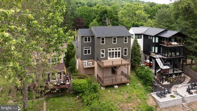 Some homes are seasonal escapes. 159 Byram Lane is something far - photo 2