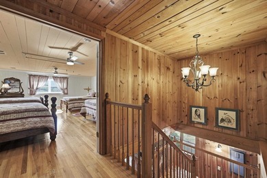 Situated on a private peninsula lot within the sought-after - photo 26