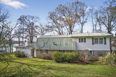 Situated on a private peninsula lot within the sought-after - photo 33