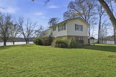 Situated on a private peninsula lot within the sought-after - photo 34