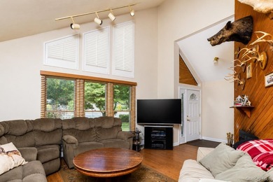 Located on a cul-de-sac in desirable Mount Sinai, this charming - photo 3