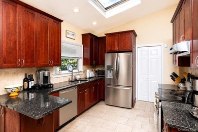 Located on a cul-de-sac in desirable Mount Sinai, this charming - photo 6