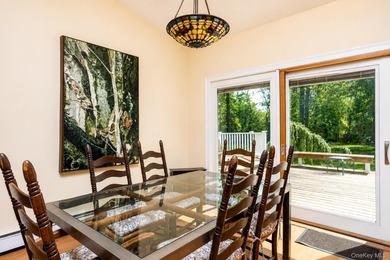 Located on a cul-de-sac in desirable Mount Sinai, this charming - photo 7