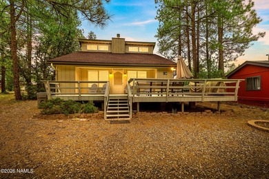Escape to the cool pines of Munds Park in this inviting - photo 1