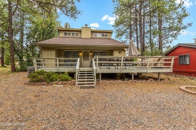 Escape to the cool pines of Munds Park in this inviting - photo 2