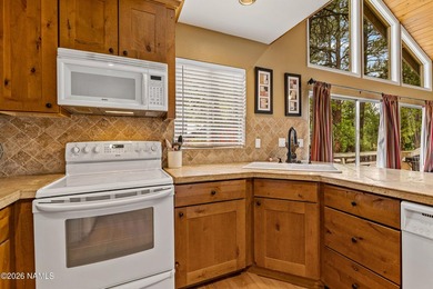 Escape to the cool pines of Munds Park in this inviting - photo 9