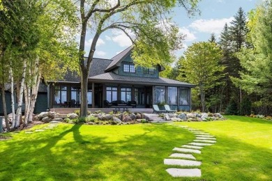 Lake Home For Sale in Forest Home Twp, Michigan