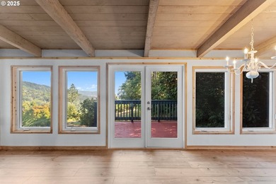 Stunning ocean and mountain views from this desirable home on - photo 6