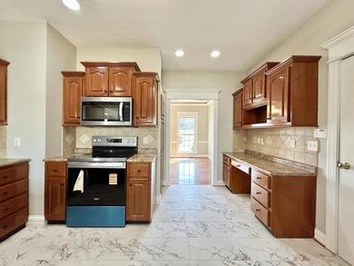 Welcome to this beautiful two-story brick home located in the - photo 15