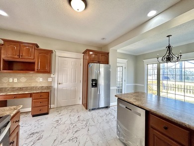 Welcome to this beautiful two-story brick home located in the - photo 18