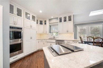 SEPARATE LIVING SPACE WITH 4TH CAR GARAGE AND SEPERATE ENTRANCE!